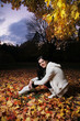 Beautiful young woman in autumn park.
