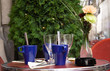 Parisian street cafe table with Christmas tree in the background