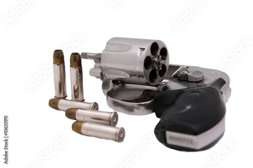 Photo: Revolver and bullets Revolver and bullets