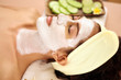 Photo: Young female enjoying a facial beauty treatment Young female enjoying a facial beauty treatment