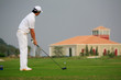 golfer striking