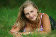 busty girl in green grass