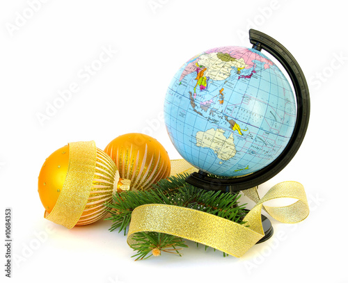Photo: World globe and christmas decoration World globe and christmas decoration