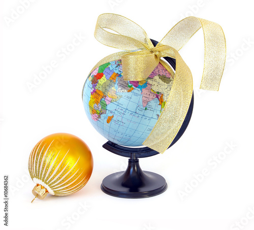 Photo: World globe and christmas sphere World globe and christmas sphere
