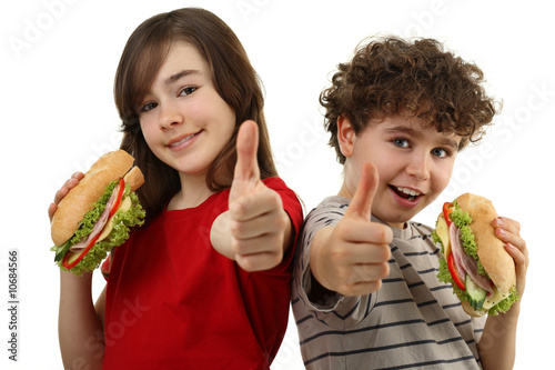 Kids eating healthy sandwiches showing Ok sign, isolated
