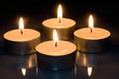 Four candles on glass Four candles on glass