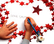 Child writing letter to Santa