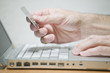 Man using credit card online Man using credit card online