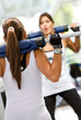 woman lifting weights