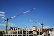 Big crane and new building.