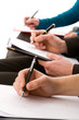 Business people taking notes
