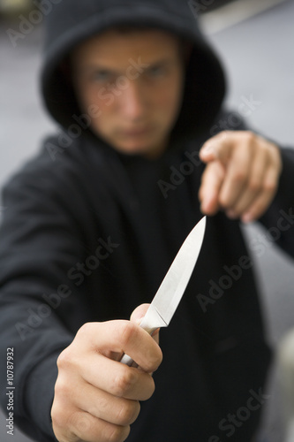 Photo: Teenage Boy Branding Knife Teenage Boy Branding Knife