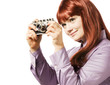 Young woman taking picture with a retro camera Young woman taking picture with a retro camera