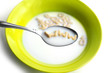 Bowl of milk and cereal with "www" letters
