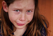 Young girl crying
