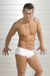 Photo: sexy muscled man under the sun with swim suit sexy muscled man under the sun with swim suit