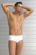 Photo: sexy muscled man under the sun with swim wear sexy muscled man under the sun with swim wear