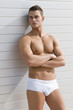 Photo: sexy muscled man under the sun with swim suit sexy muscled man under the sun with swim suit
