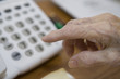 Senior dialing the number
