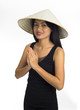 young asian woman with typical welcome expression