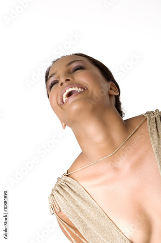 Photo: Portrait of a young smiling woman in low-cut dress Portrait of a young smiling woman in low-cut dress
