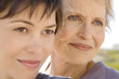Senior woman and adult daughter, outdoors