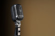 Vintage Microphone over Gradient Background Vintage Microphone over Gradient Background