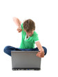 Angry boy looking at laptop computer Angry boy looking at laptop computer