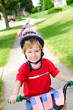 Boy on a bike on the 4th of July