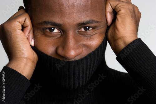 Photo: Man Wearing Turtleneck Sweater Man Wearing Turtleneck Sweater