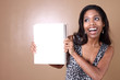 Woman holding a blank notebook