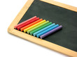 Blackboard and chalks in rainbow
