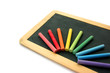 Blackboard and chalks in rainbow