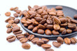 Roasted coffee beans laying on the black plate