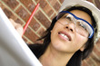 Female Engineer/Inspector brick background Female Engineer/Inspector brick background