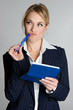 Photo: Businesswoman Writing Check Businesswoman Writing Check