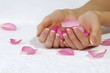 Beautiful hands with rose petals Beautiful hands with rose petals