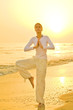 Yoga exercise on a golden sunrise Yoga exercise on a golden sunrise