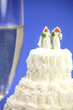 Photo: Lesbian couple on a wedding cake. Gay marriage concept. Lesbian couple on a wedding cake. Gay marriage concept.