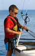Photo: enfant gréant son catamaran enfant gréant son catamaran