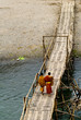 Young Monks on a bridge, Luang Prabang, Laos