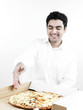 portrait of a smart looking asian man eating pizza