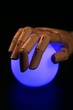 Wooden mannequin hand, ball of light, fortune teller Wooden mannequin hand, ball of light, fortune teller