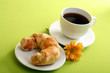 Breakfast concept with coffee and croissant Breakfast concept with coffee and croissant