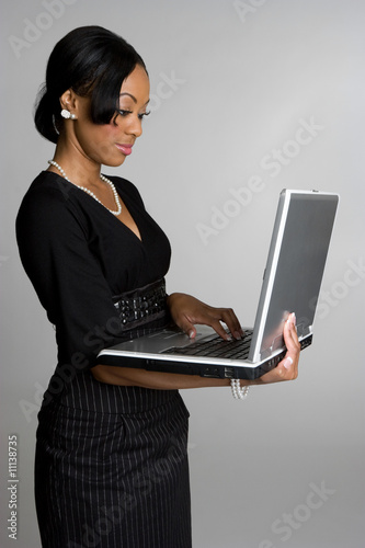 Photo: Woman With Laptop Woman With Laptop