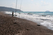 Fisherman on the seashore