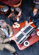 top view of three business people meeting