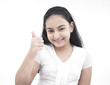 portrait of an asian teenage girl showing thumbs up