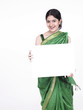beautiful asian woman with a blank white placard