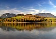 Reflection of mountains in deep lake
